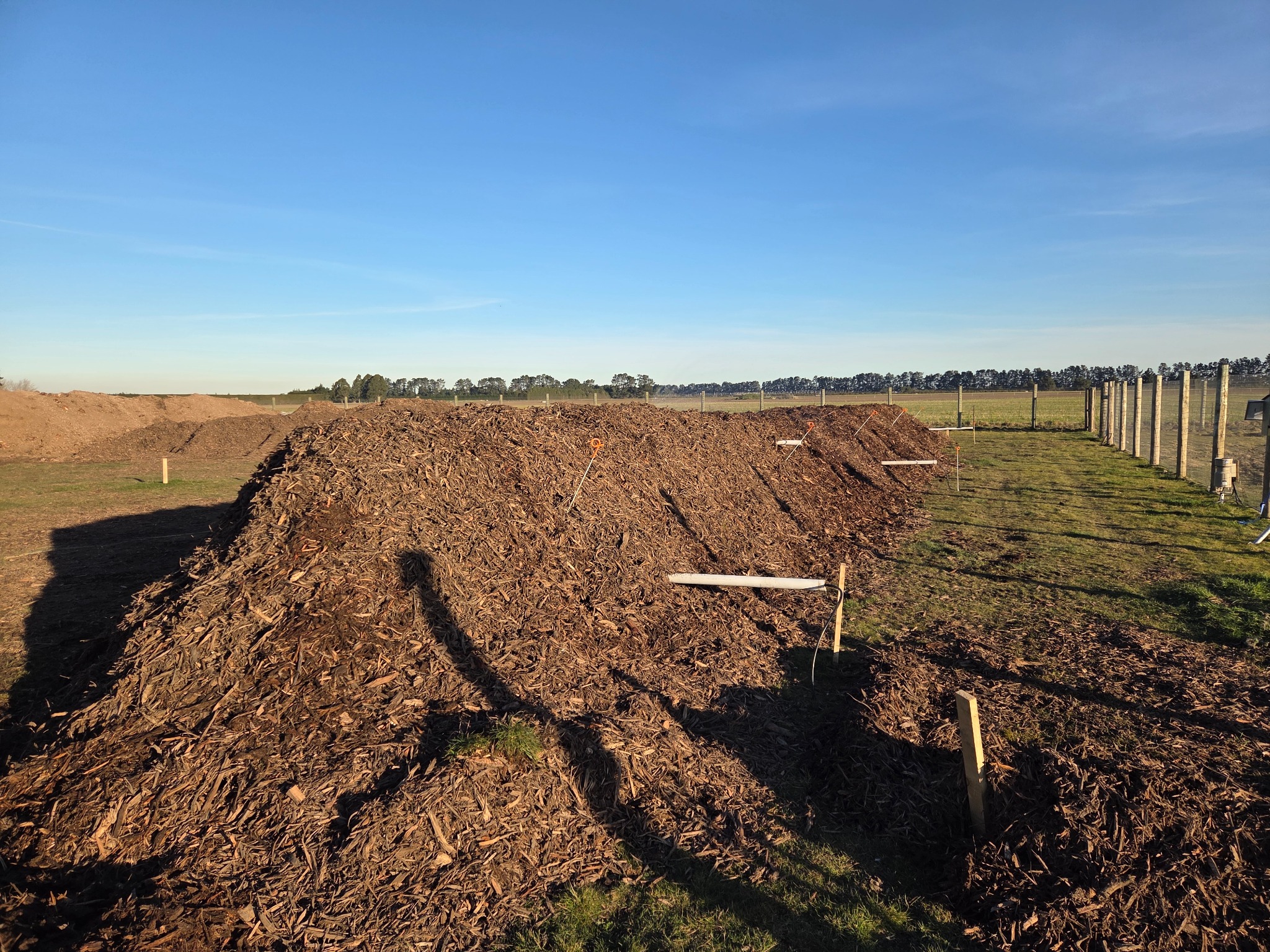 Farm-scale compost windrows under temperature monitoring